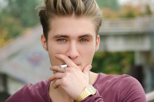 Teen boy smoking Teen boy smoking