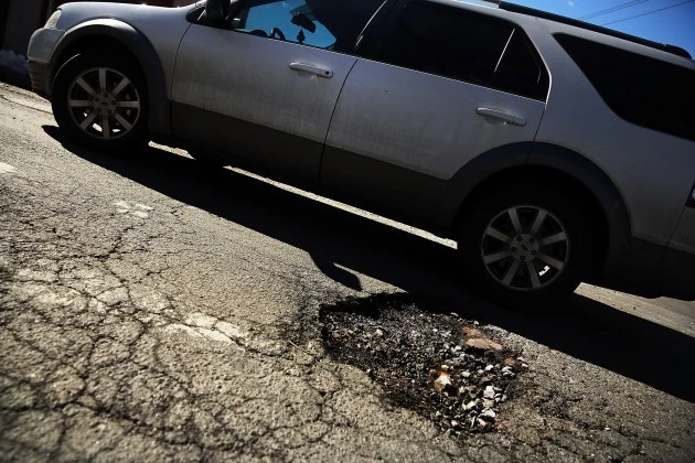 Harsh Winter Creates High Number Of Potholes On New York City's Roads