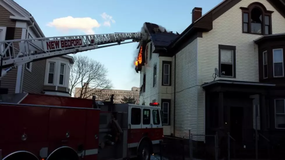 TSM - Flames still visible from attic at 56 Hill St. Monday afternoon