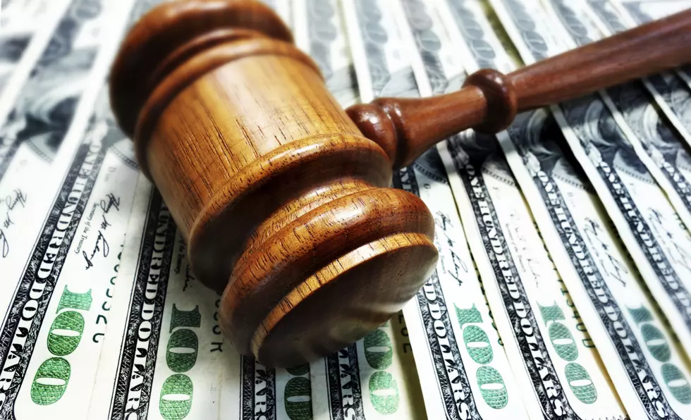 Easton Woman and Son Charged With Embezzlement